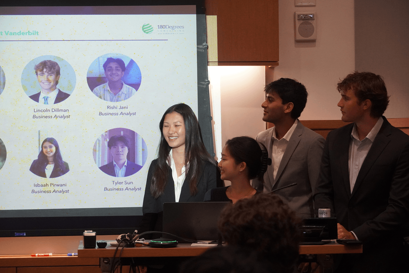180DC Vanderbilt members presenting during a chapter meeting